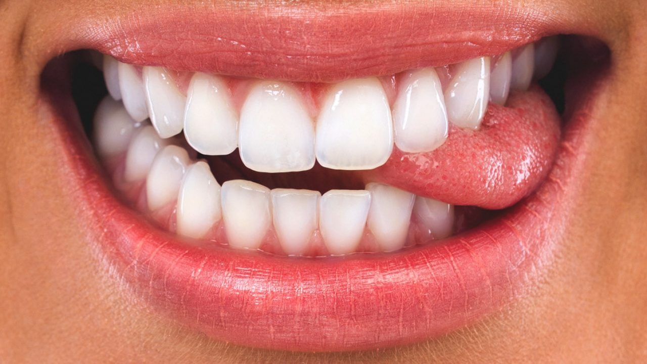 Cắn vào lưỡi đánh con lô gì? Giải mã điềm báo con số may mắn